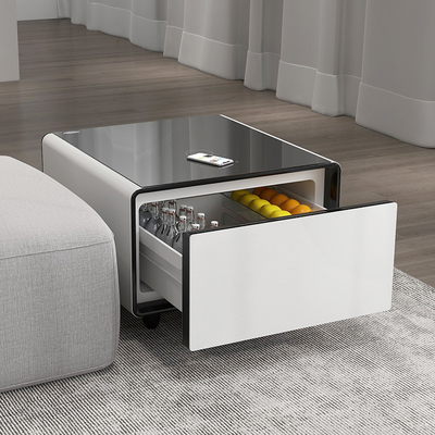 Mesa de sala de estar moderna com geladeira e carregamento sem fio